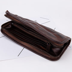 Cartera vintage de los años 50 con cremallera de cuero curtido vegetal