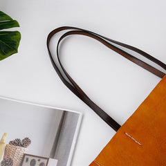 Handgefertigte Tragetaschen aus pflanzlich gegerbtem Rindsleder