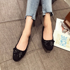 Zapatos planos de piel auténtica con lazos