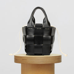 Handgefertigte Handtaschen aus gewebtem Leder