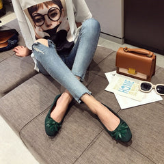 Zapatos planos de piel auténtica con lazos