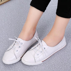 Zapatos planos de piel auténtica con cordones