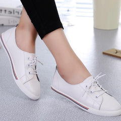 Zapatos planos de piel auténtica con cordones