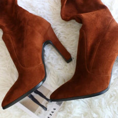 Botas altas sin cordones con tacones altos