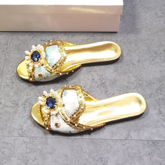 Pantuflas planas con flores y diamantes de imitación dorados