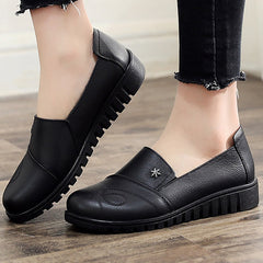 Zapatos planos de piel auténtica con punta redonda