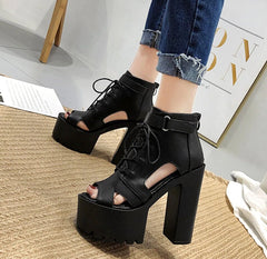 Botines de tacón alto con cordones y punta abierta