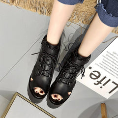 Botines de tacón alto con cordones y punta abierta