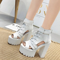 Botines de tacón alto con cordones y punta abierta