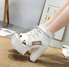 Botines de tacón alto con cordones y punta abierta