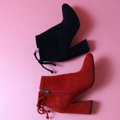 Botines de tela con tacones altos