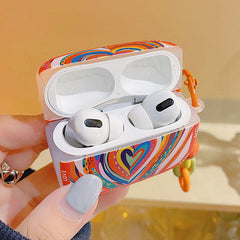 Estuche para AirPods con forma de corazón de colores