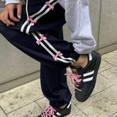 Coquette Hose mit Schleifen und seitlichen Streifen