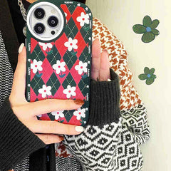 Funda para iPhone con diseño de margaritas y rombos
