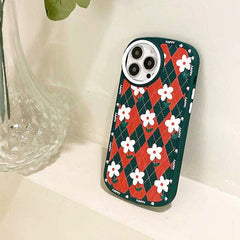Funda para iPhone con diseño de margaritas y rombos