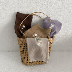 Socken mit Gänseblümchen-Stickerei