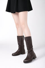 Botas altas de piel sintética con punta redonda