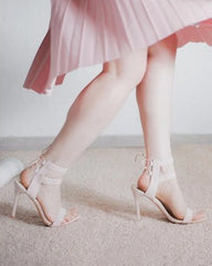 Sandalias de tacón alto con tiras en el tobillo