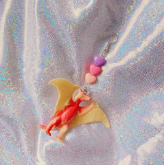 Pendientes de dinosaurios