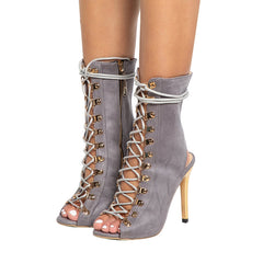 Botines de tacón alto con tiras en T y punta abierta