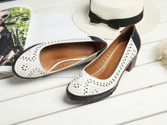 Spitz zulaufende Pumps aus Leder mit hohem Absatz