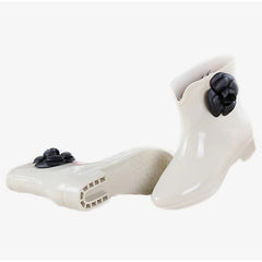 Gummistiefeletten mit dekorativer Blume/Fliege