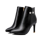 High Heel Stiefeletten mit dekorativer Kristallschleife