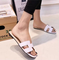 Chanclas planas de PU