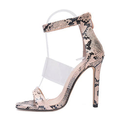 Sandalias de tacón alto con tiras en el tobillo y estampado de serpiente