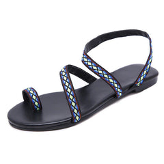 Flache Gladiatorsandalen aus PU-Leder mit ethnischer Stickerei