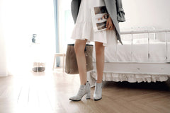 Botines de tacón con punta a cuadros