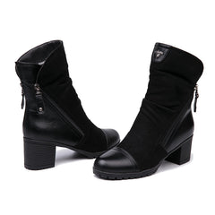 Botines de piel de ante con tacón alto y punta redonda