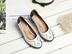 Spitz zulaufende Pumps aus Leder mit hohem Absatz