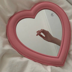 Dekorativer Spiegel in Herzform