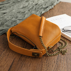 Handtaschen mit Kette aus pflanzlich gegerbtem Leder