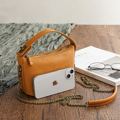 Handtaschen mit Kette aus pflanzlich gegerbtem Leder