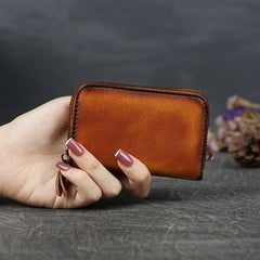 Bonita cartera pequeña de cuero con cremallera