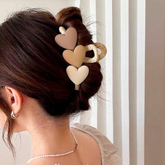Pastellfarbene Haarklammer mit Herzmotiv