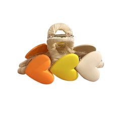 Pastellfarbene Haarklammer mit Herzmotiv