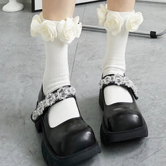 Gerippte Socken mit Rosen