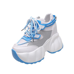 Chunky Sneakers mit hohem Absatz und Plateausohle und Bling