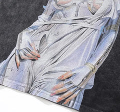 Camiseta oversize desgastada con estampado gráfico