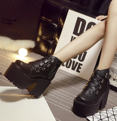 Botines de tacón alto con punta redonda