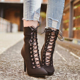 Stiefeletten mit hohem Absatz und Schnürung aus Flock