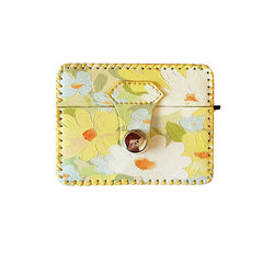 Gelbe Airpods-Hülle mit Blumenmuster