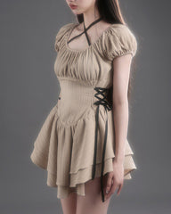 Vestido mini coqueto en beige
