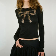 Top de encaje transparente con lazo Coquette