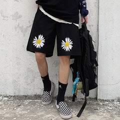 Shorts mit Gänseblümchen-Stickerei