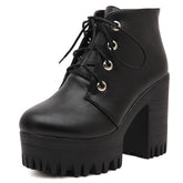 Botas negras de tacón alto