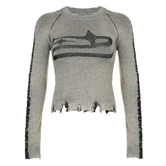 Top de manga larga con estrellas rasgado